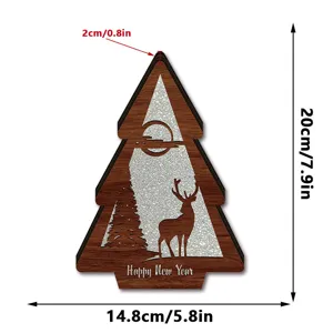 Wooden Christmas tree ornament detail, deer and moon silhouette, festive tabletop decor.