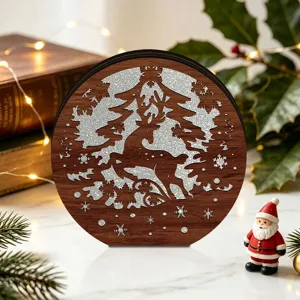 Detailed view of wooden Christmas LED glowing tabletop ornament with deer hollow design.