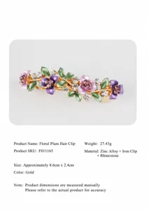 Detailed shot of alloy floral hair clip with sparkly rhinestones, elegant spring barrette design.