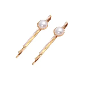 Elegant vintage gold faux pearl hair clips, stylish side pins for daily hair styling.