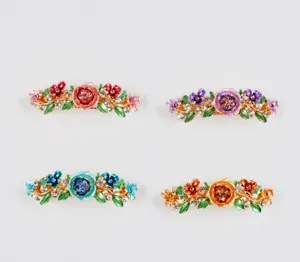 Detailed view of alloy floral spring hair clips with colorful rhinestones, four colors.