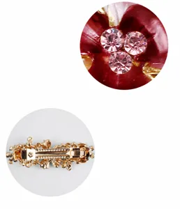 Detailed macro view showcasing the sparkling rhinestone inlay and durable back spring clip mechanism.