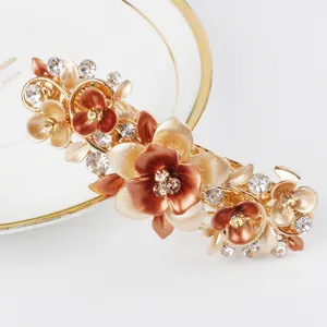 Detailed close-up view showcasing the exquisite alloy floral rhinestone spring hair clip.