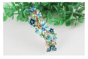 Korean style alloy women hair clip with blue enamel flowers and sparkling rhinestones.