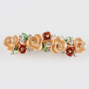 Korean style alloy floral spring hair clip with rhinestones and elegant enamel design.
