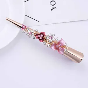 Elegant alloy hair clip featuring enamel flowers and sparkling rhinestones for women, perfect styling accessory.