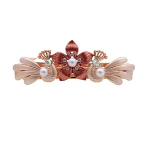 Elegant alloy hair clip featuring pearl rhinestone flower and peacock wing design for women.