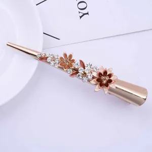 Elegant rose gold metal hair clip with rhinestone enamel flowers for women fashion styling.
