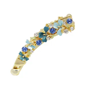 Korean style golden metal banana hair clip with blue enamel flowers and sparkling crystal rhinestones.
