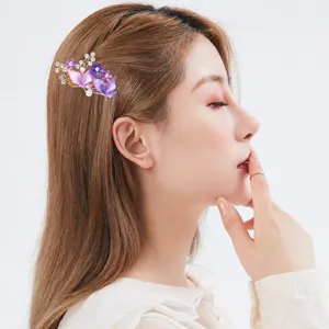 Elegant purple flower hair clip with pearls and rhinestones for women side clip accessories.