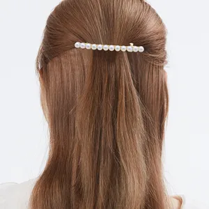 Élégante pince à cheveux en perles pour femmes, barrette dorée pour coiffures demi-attachées.