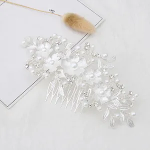 Elegant floral pearl hair comb for women, silver alloy rhinestone updo bridal hair accessory.