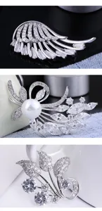 Crystal rhinestone pearl brooch detail shot, exquisite craftsmanship and silver metal finish.
