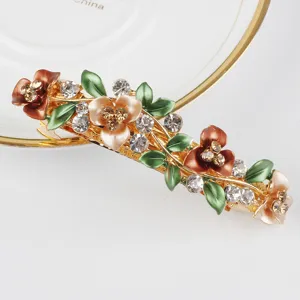 Korean alloy floral hair clip for women, large rhinestone spring clip elegant hair accessory.