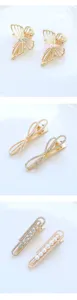 Elegantes Haarklammern Set in Gold mit Perlen und Strass, Schmetterling und Schleife Friseurklemmen.
