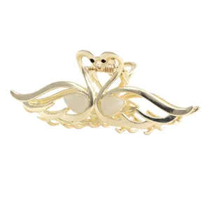 Pince à cheveux cygne dorée avec pierre œil de chat pour femmes, grand accessoire pour cheveux.