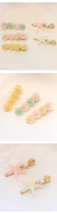 Handmade pearl starfish hair clip and sweet macaron round hairpin detailed view.