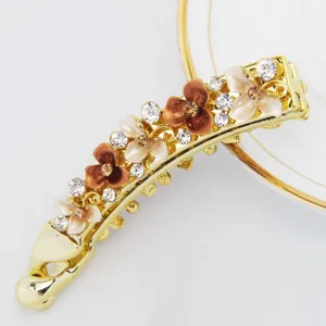 Goldfarbene Legierung Blumen Bananen Haarklammer Detailansicht, funkelnde Strasssteine Blumen.