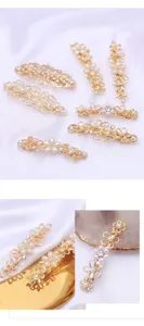 Gold alloy flower hair clips with pearls and rhinestones for elegant women's half up hairstyles.