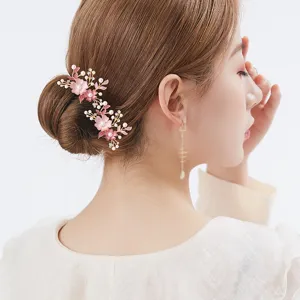 Elegant floral hair comb with pearls and pink petals for women updo styling accessories