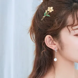 Sweet fresh floral hair clip side pin and elegant moon pearl drop earrings for women.
