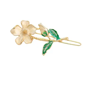 Elegant floral hair clip with white enamel flower and green leaves sweet style main view