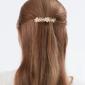 Elegant alloy pearl flower hair clip for women, beautiful half up spring barrette accessory.