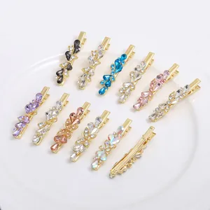 Shining rhinestone bow duckbill hair clips set, elegant metal side clips for women daily styling.