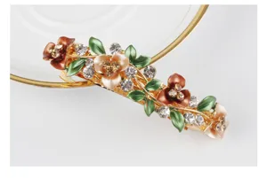Alloy enamel rhinestone flower hair clip, elegant spring barrette for women's daily hair styling.