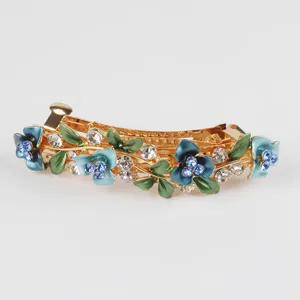 Exquisite alloy rhinestone floral hair clip with blue enamel and green leaves for elegant styles.