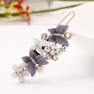 Élégante pince à cheveux papillon fleur en émail avec strass étincelants pour femmes.