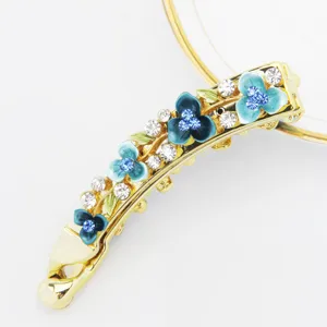 Pinza de pelo tipo plátano de metal con flores de esmalte azul y diamantes de imitación de 10cm.