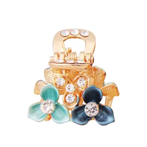 Jolie pince à cheveux griffe florale avec strass pour femmes, mini barrette dorée élégante.