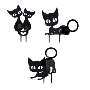 Close-up details of black acrylic cat garden stakes, cute silhouette yard art decoration.