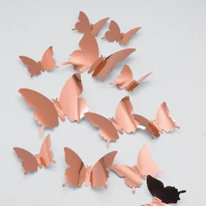 Gros plan detail de 3d miroir papillon autocollant mural set, or rose decor interieur DIY