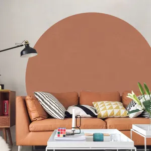 Boho terracotta half-circle arch wall sticker detail view in a cozy modern living room.