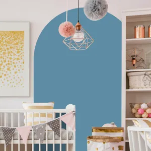 Detailed scene view showing boho arch wall sticker styling in a modern nursery bedroom decor.