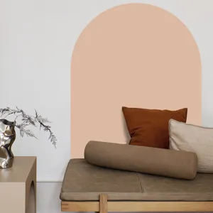 Detail view of boho arch wall sticker scene with wooden bench and cozy decorative pillows.