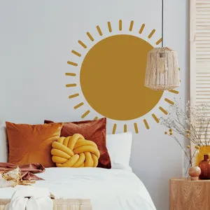 Boho style sun wall sticker detail view in a cozy warm bedroom aesthetic scene, minimalist decor.