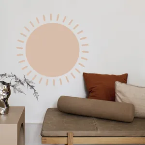Boho style minimalist sun wall sticker detail in cozy living room interior decor setup.