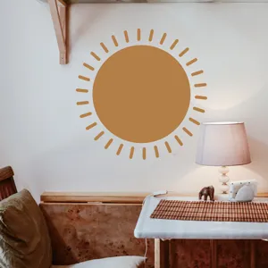 Boho style sun wall sticker shown in a cozy living room scene for home decoration.