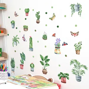 Adesivi murali con cactus e farfalle fluorescenti, perfetti per la decorazione della cameretta.