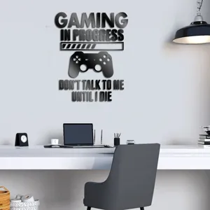 Detail view of the gaming in progress mirror wall sticker featuring a controller design for room decor.