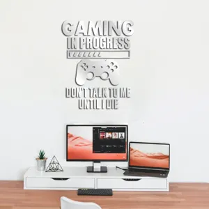 Gaming wall sticker detail view featuring inspirational gamer quote and controller design.