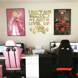 Detail shot of the gold acrylic level up gaming wall sticker mounted on a room wall.