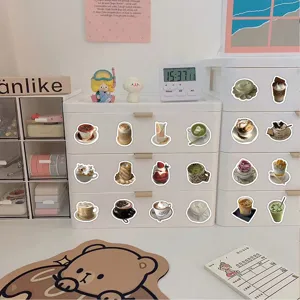 Close-up detail view of cute cartoon drink stickers showcasing various coffee and beverage designs.