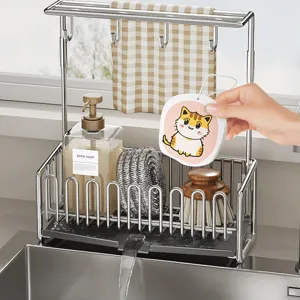 Stainless steel kitchen sink caddy detail showing storage basket and towel bar design.