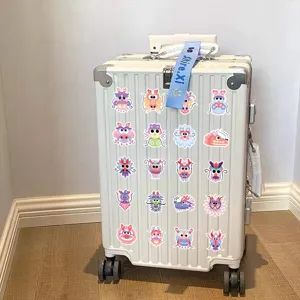 Cute cartoon dragon stickers for suitcase and laptop decor, colorful waterproof vinyl decals set.