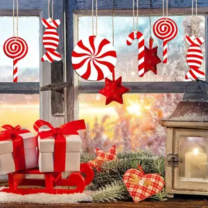 Christmas wooden candy ornaments detail showing festive red and white peppermint hanging decor.