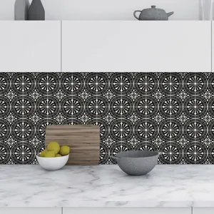 Kitchen detail scene featuring black and white geometric tile stickers and modern decor.